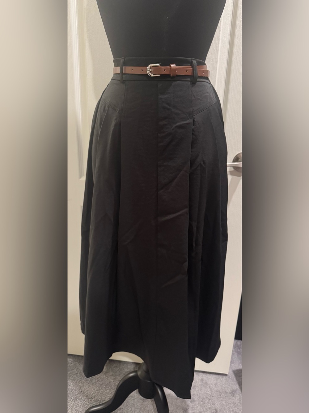 Black Maxi Skirt with belt and 2 side pockets.